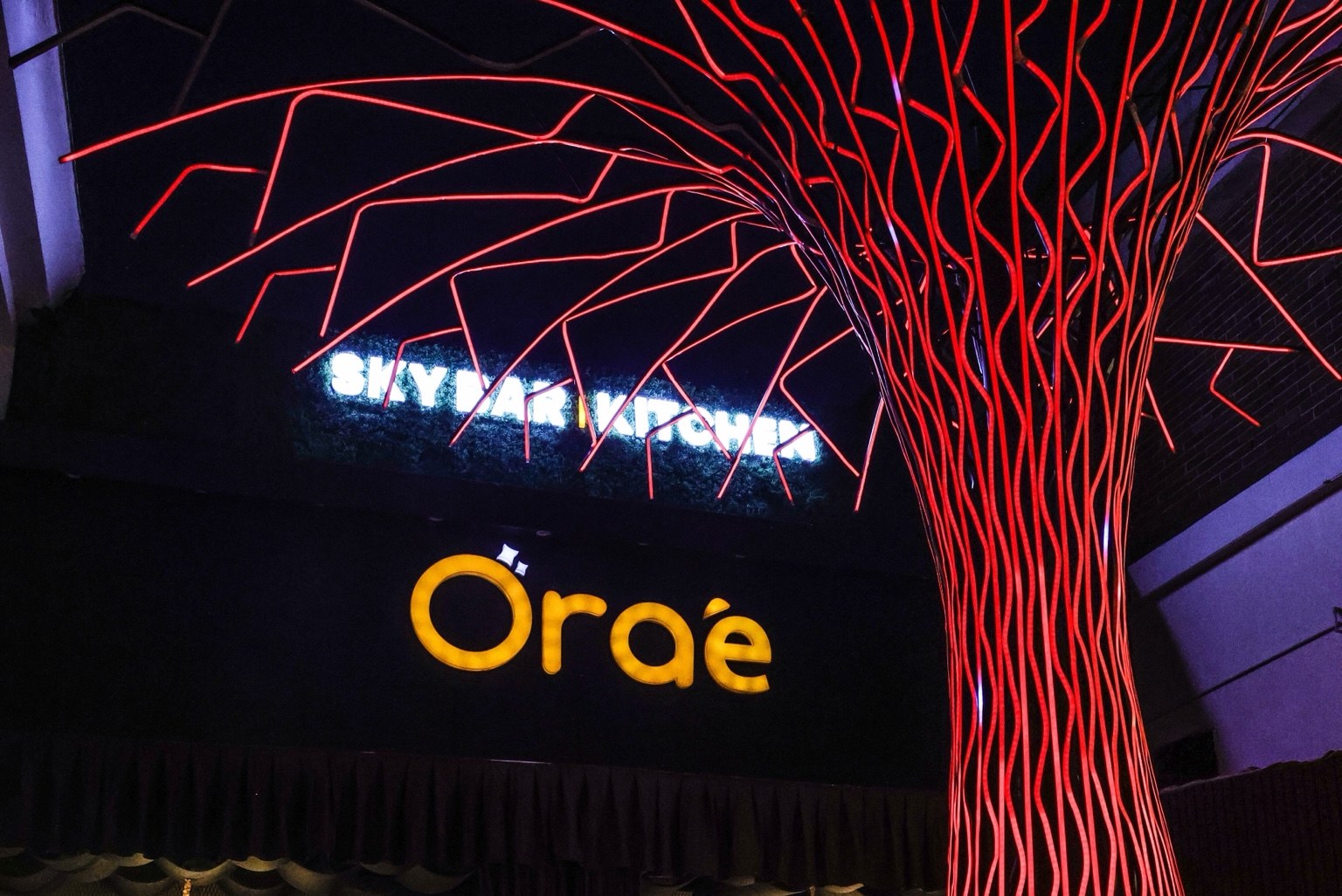 Orae venue signage and illuminated feature tree